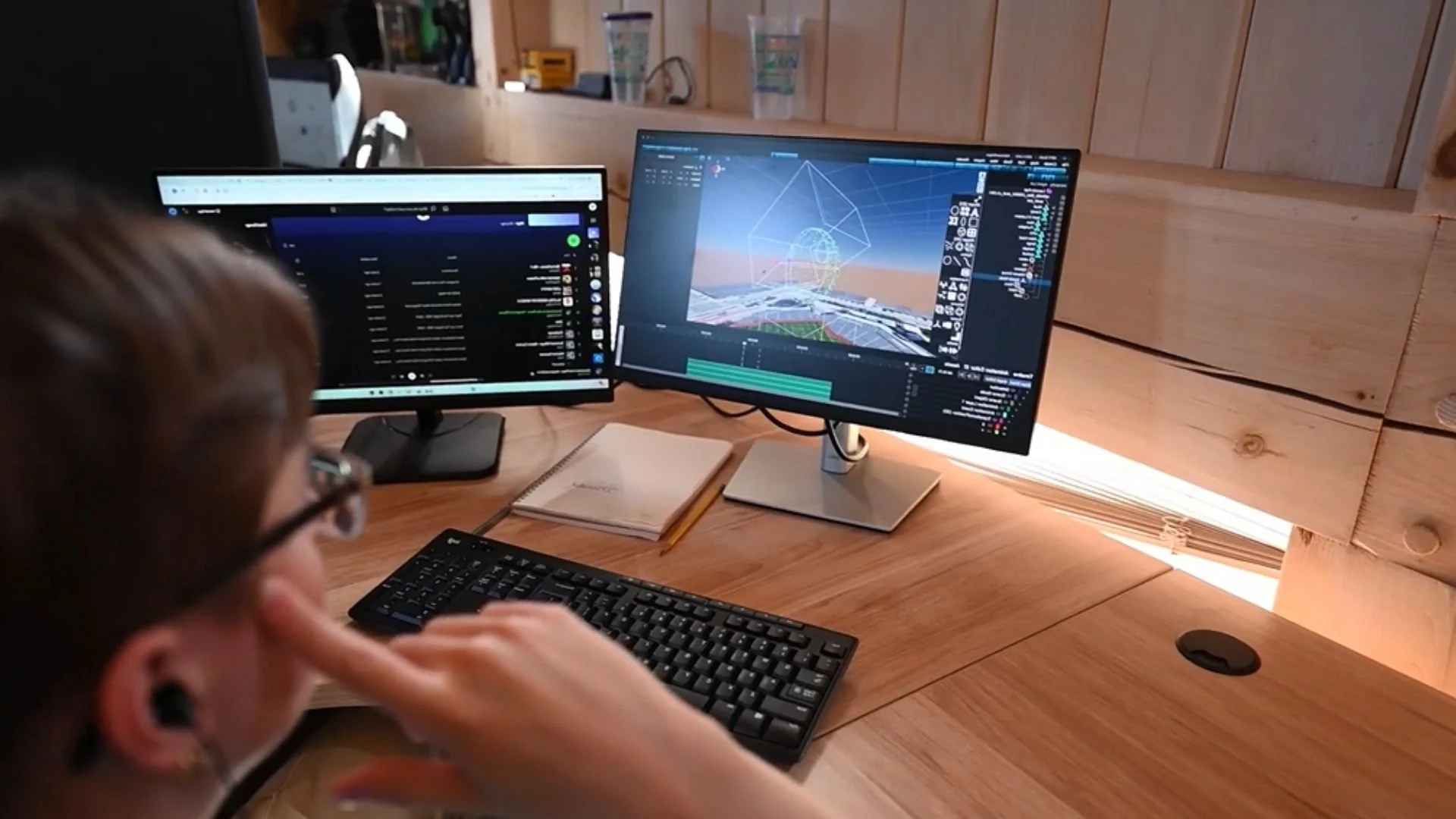 An image depicting an NLDS drone show designer working on a show.