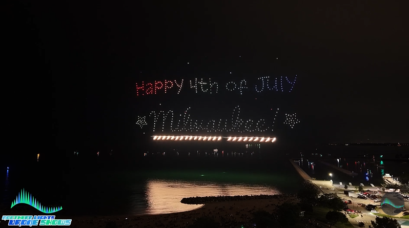 An image from an NLDS drone show showing the drones wishing the residents of Milwaukee a Happy 4th of July.