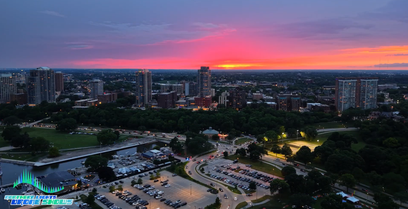 A sunset image of the Milwaukee skyline right before a Northern Lights Drone Show.