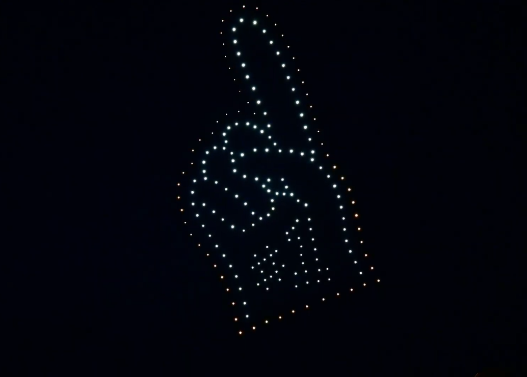 An NLDS drone show depicting a foam finger with a #1 on it that played during a sports game.