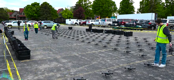 An image from the setup process of an NLDS drone show depicting the setup and safety-assurance process of the drone show.