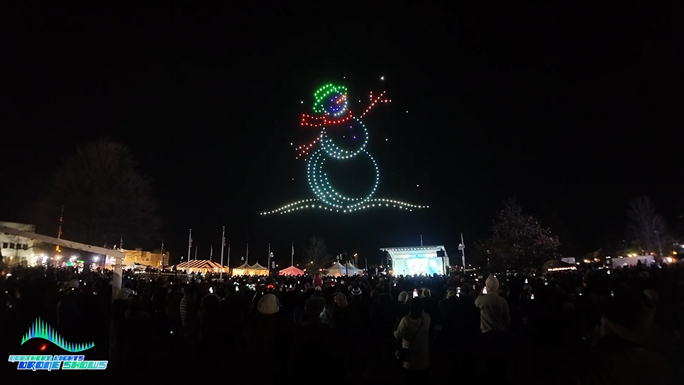 An NLDS drone show depicting a snowman during a winter festival.