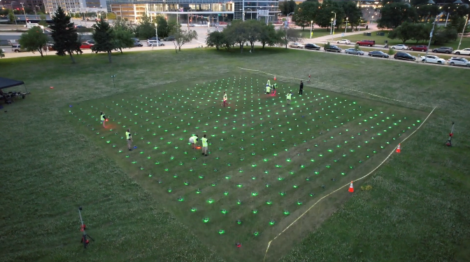 An image from an NLDS drone show depicting the ground crew setting up after driving to the site.
