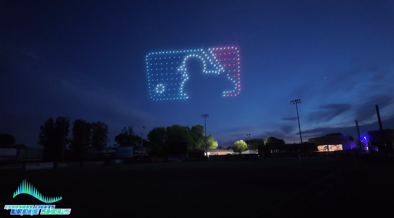 An image from an NLDS drone show performing at a baseball stadium game