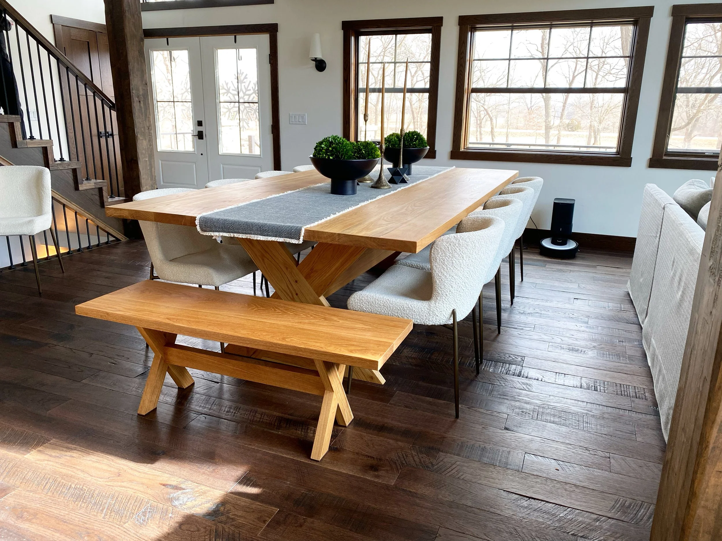 Custom white oak dinning table with matching benches.