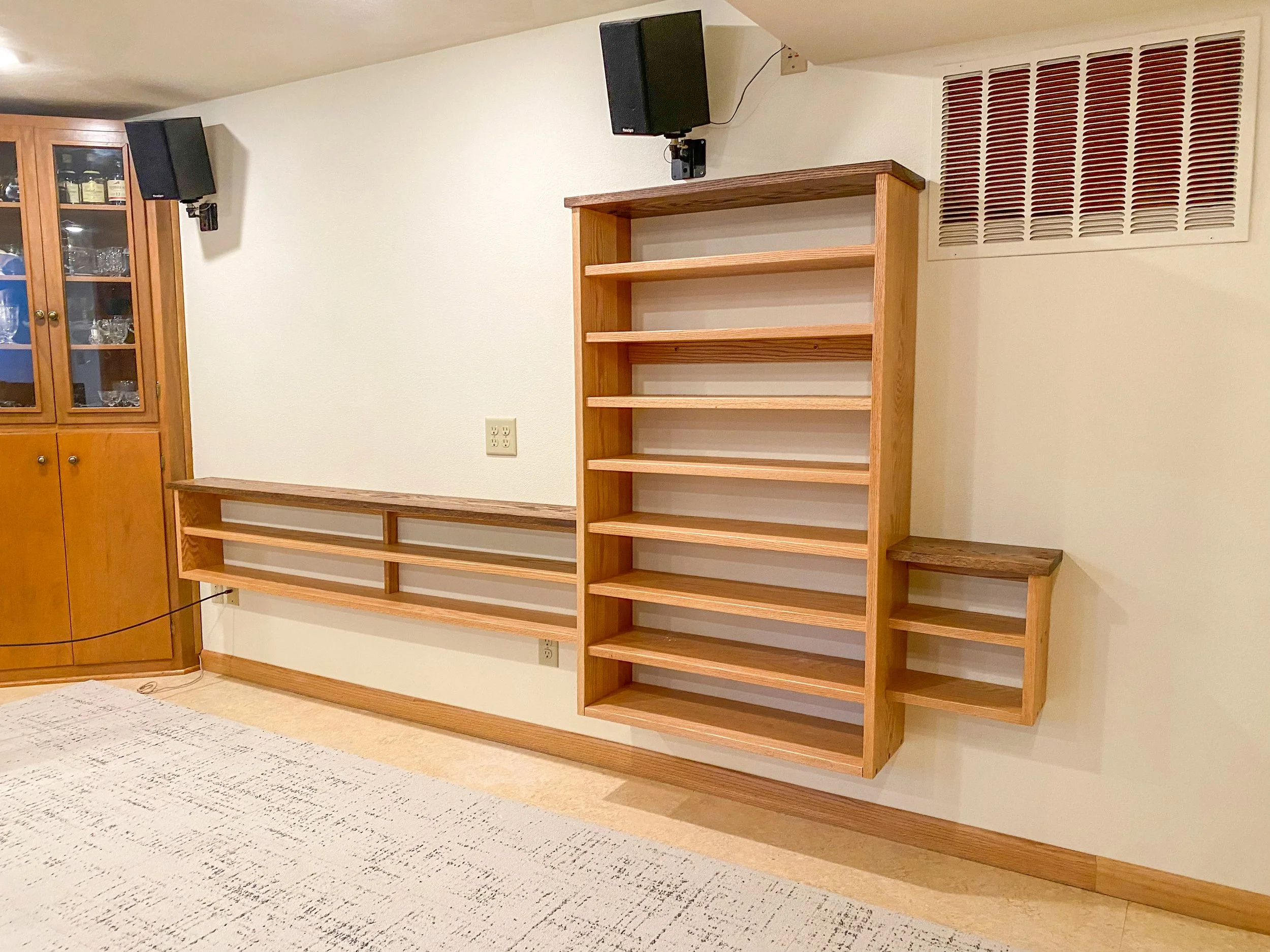 Custom entertainment shelving, flooring, and trim.