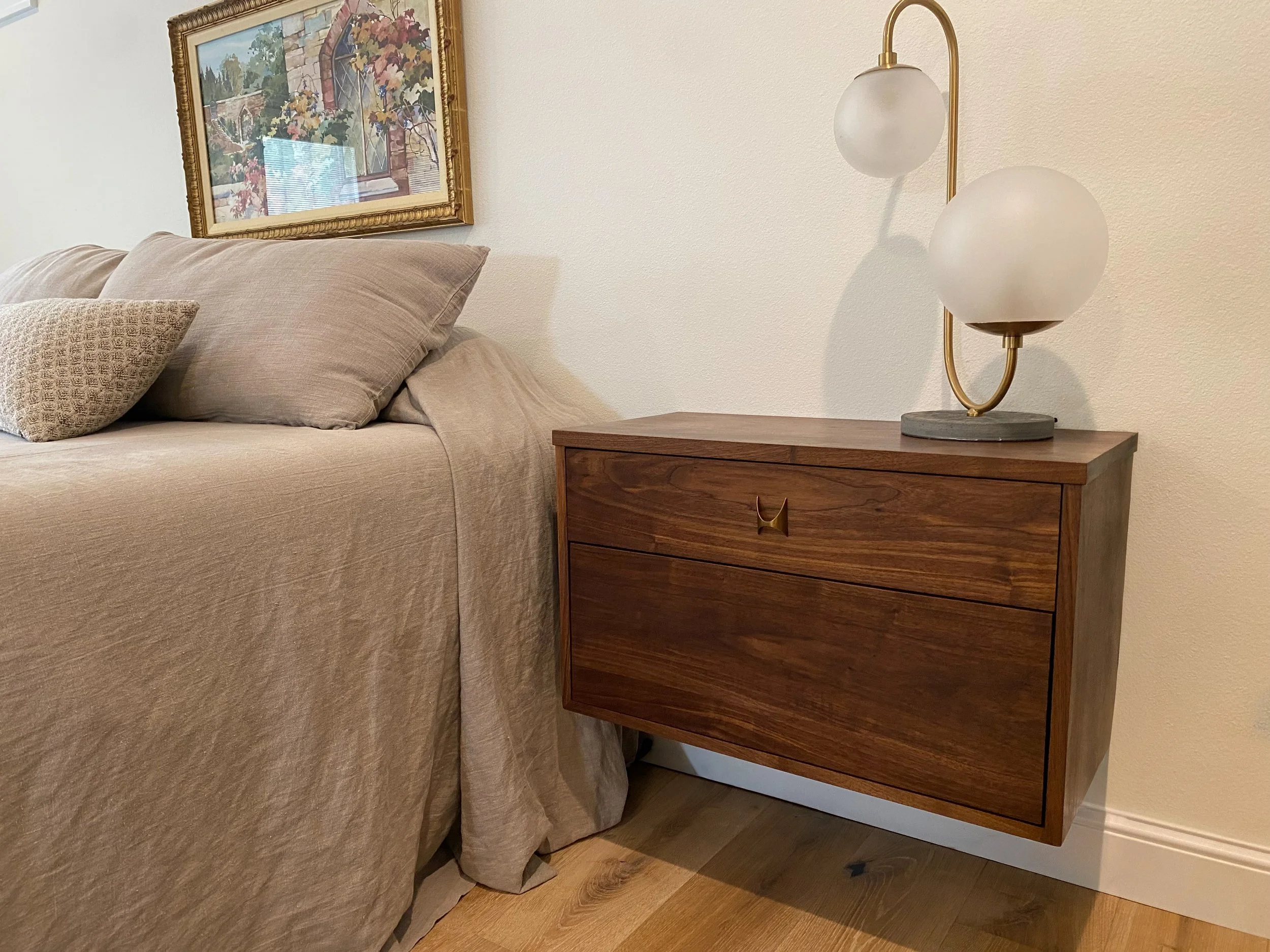 Custom solid walnut floating bedside table made to match bedroom furniture set.