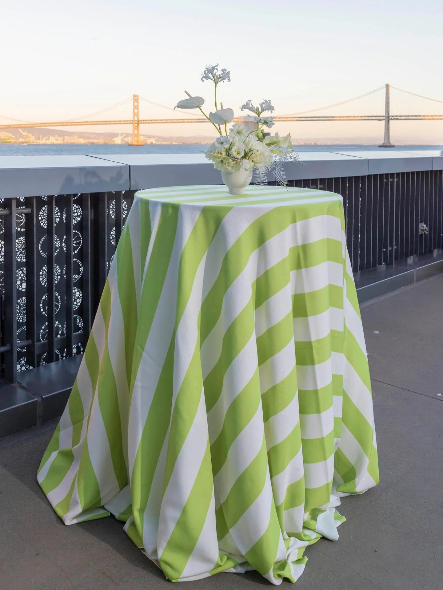 A subtle motif can bring an entire design to life. For this celebration, it was stripes! Thoughtfully carried from the custom photo booth backdrop, linens, printed pieces, band wardrobe and even catering!

Photo: @clanegessel 
Florals &amp; Fabricati