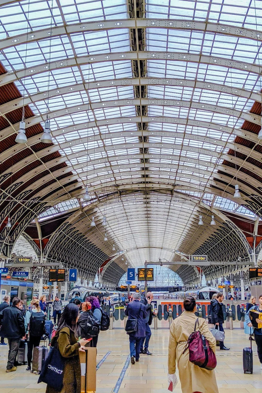 Passengers moving through Paddington station