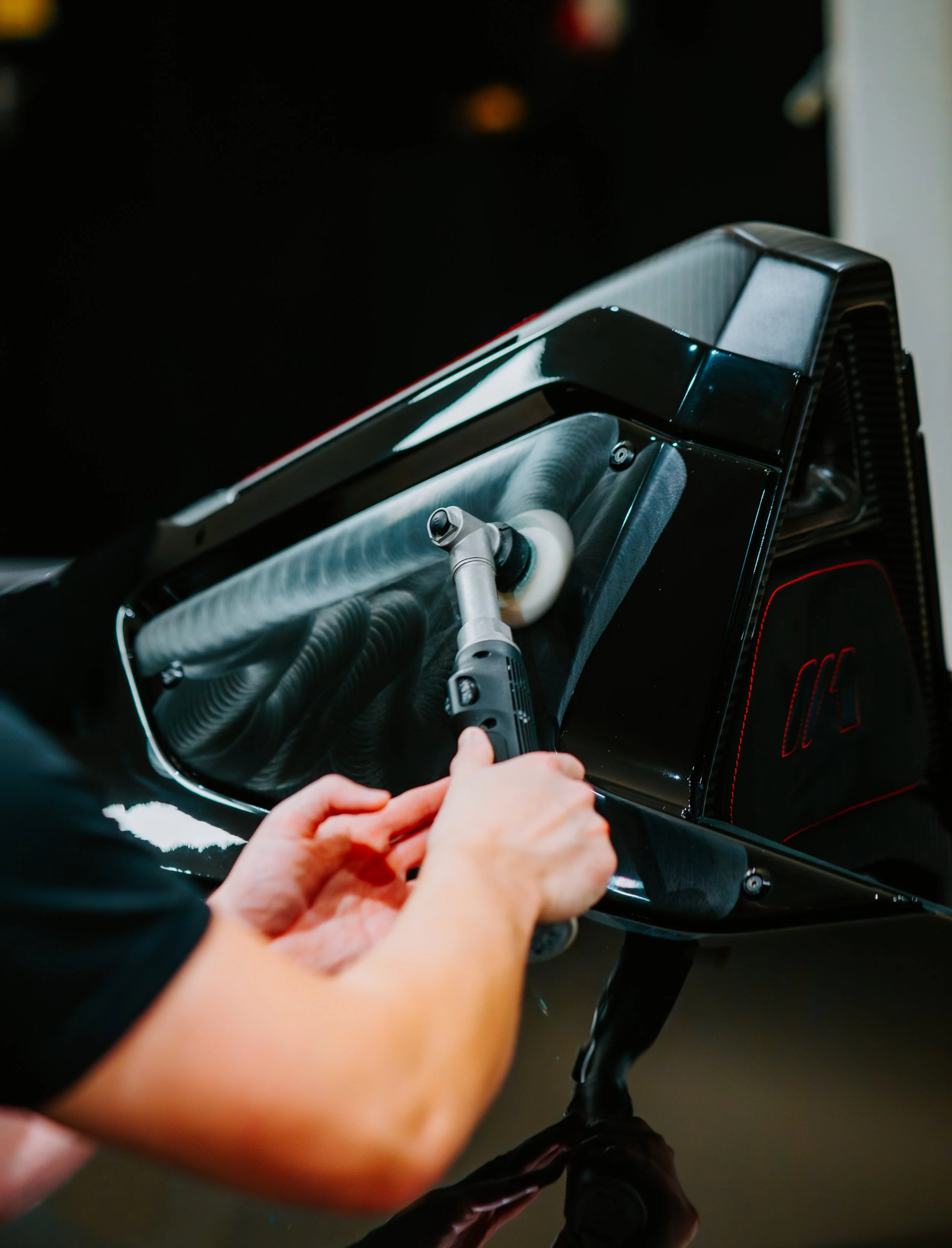Rupes polisher with white foam pad for the heavy cut step of a two-step paint correction in Baldwinsville, NY
