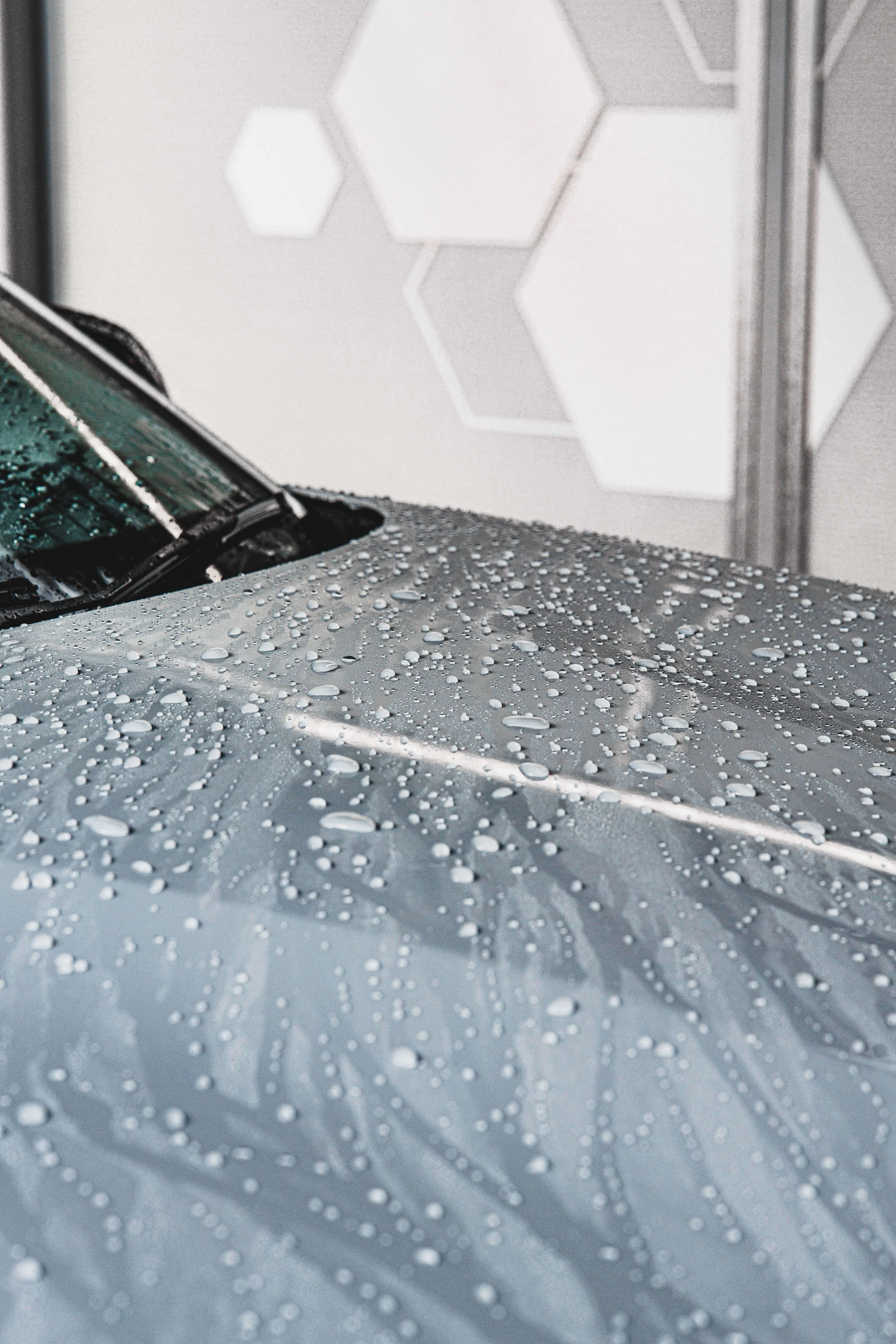 Gray BMW M2 Beading water after installing Gtechniq Crystal Serum Light and EXOv5
