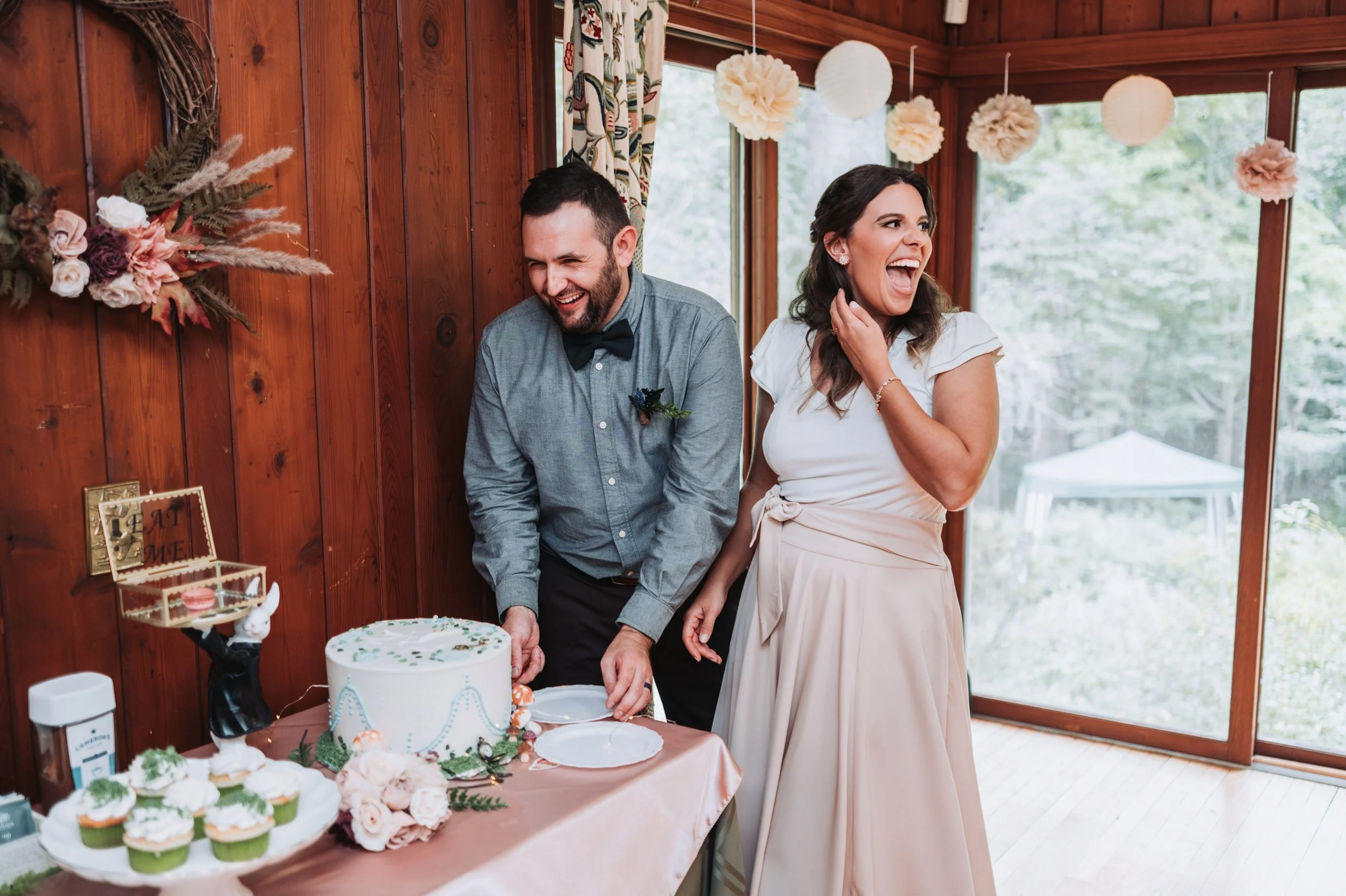 46_Bride and Groom Cutting Cake at Joslin Garden.jpg