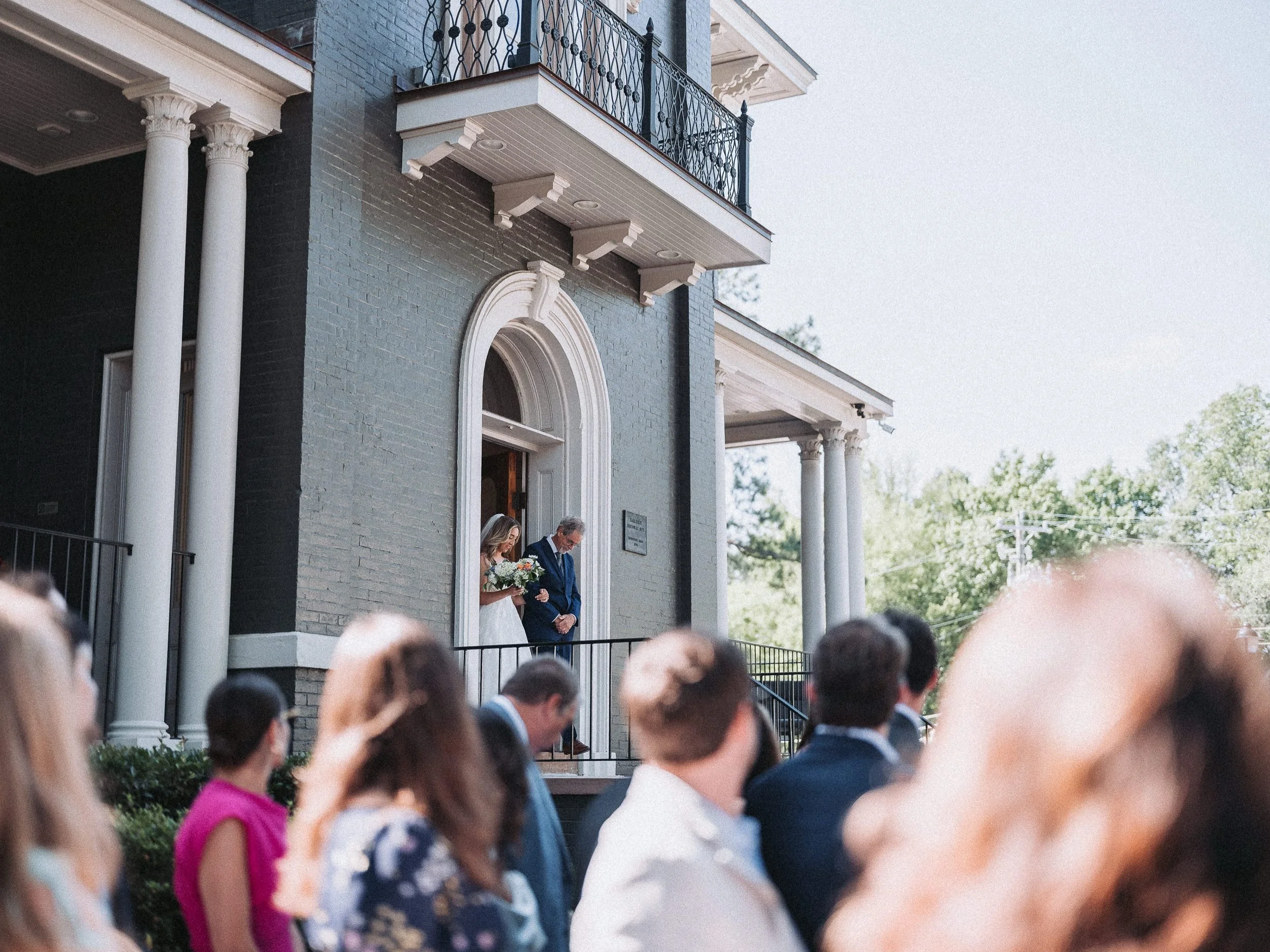 23_Bride and father entering ceremony at Heights House Hotel.jpg