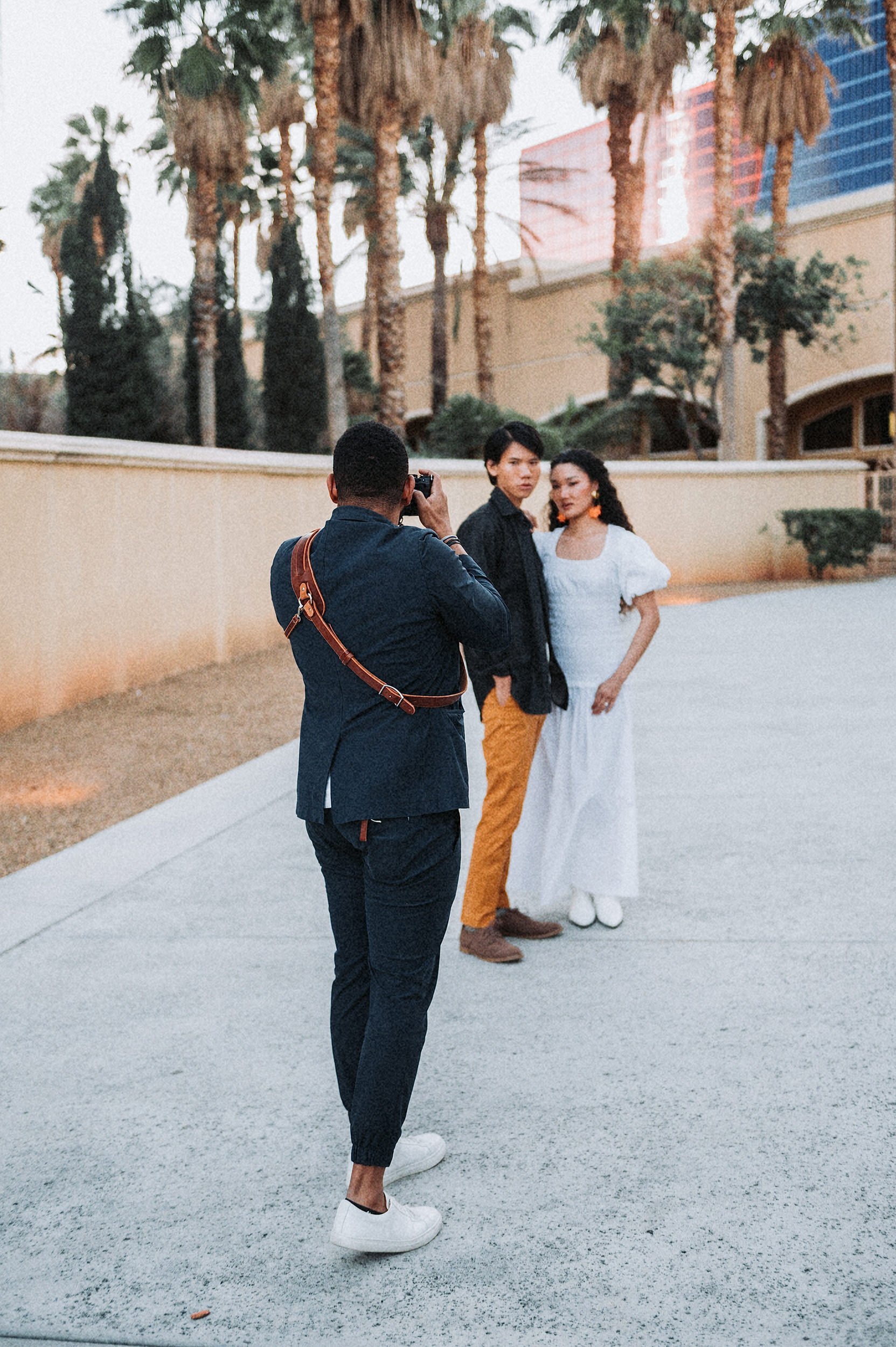 John Branch IV Wedding Photographer taking photos of a couple