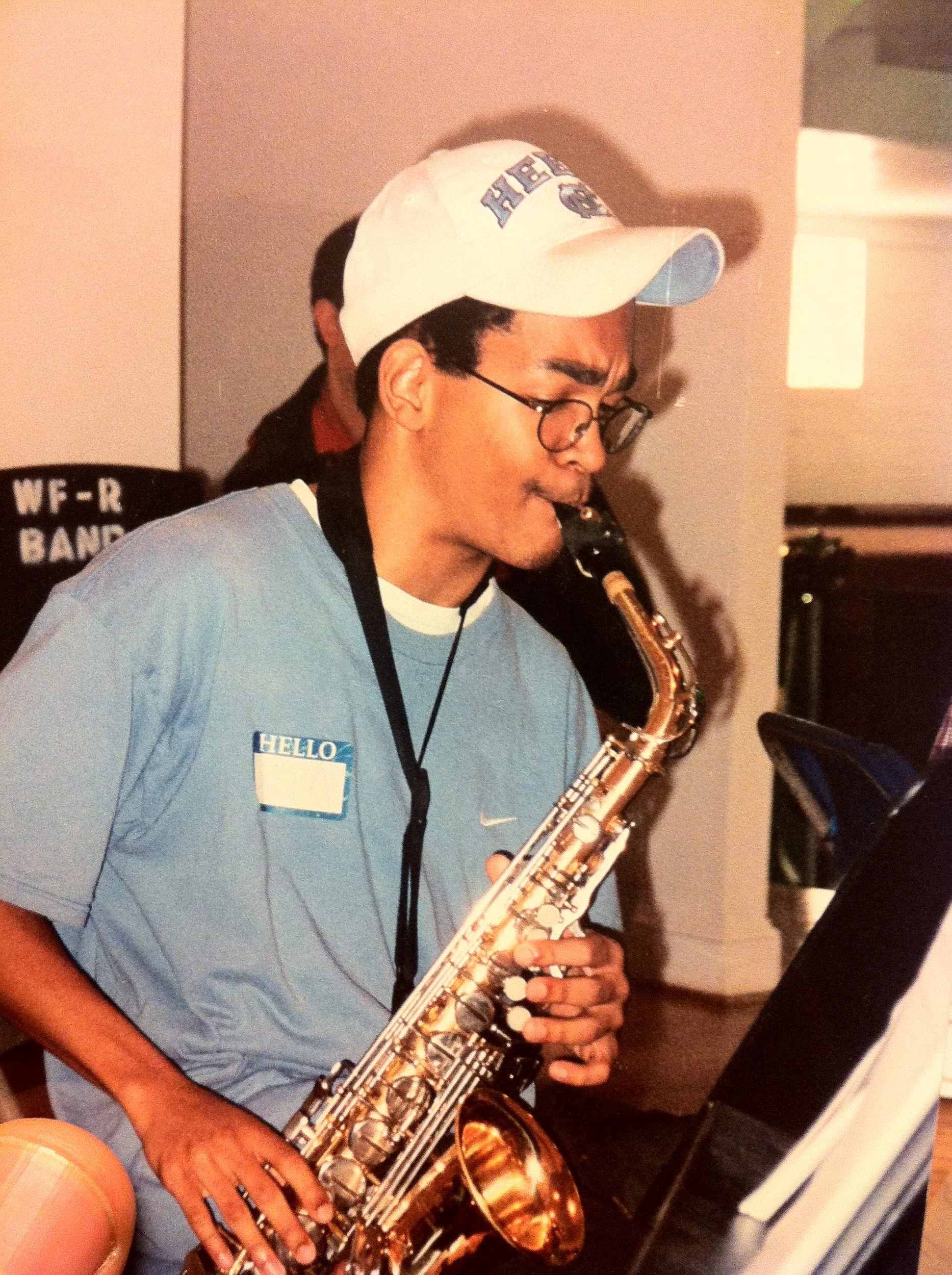 John Branch IV in his youth playing alto saxophone