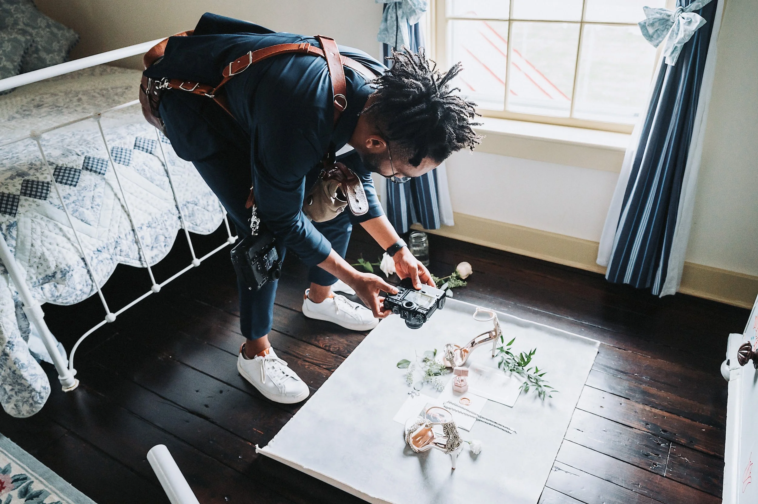 John Branch IV Raleigh Wedding Photographer taking photos of wedding rings