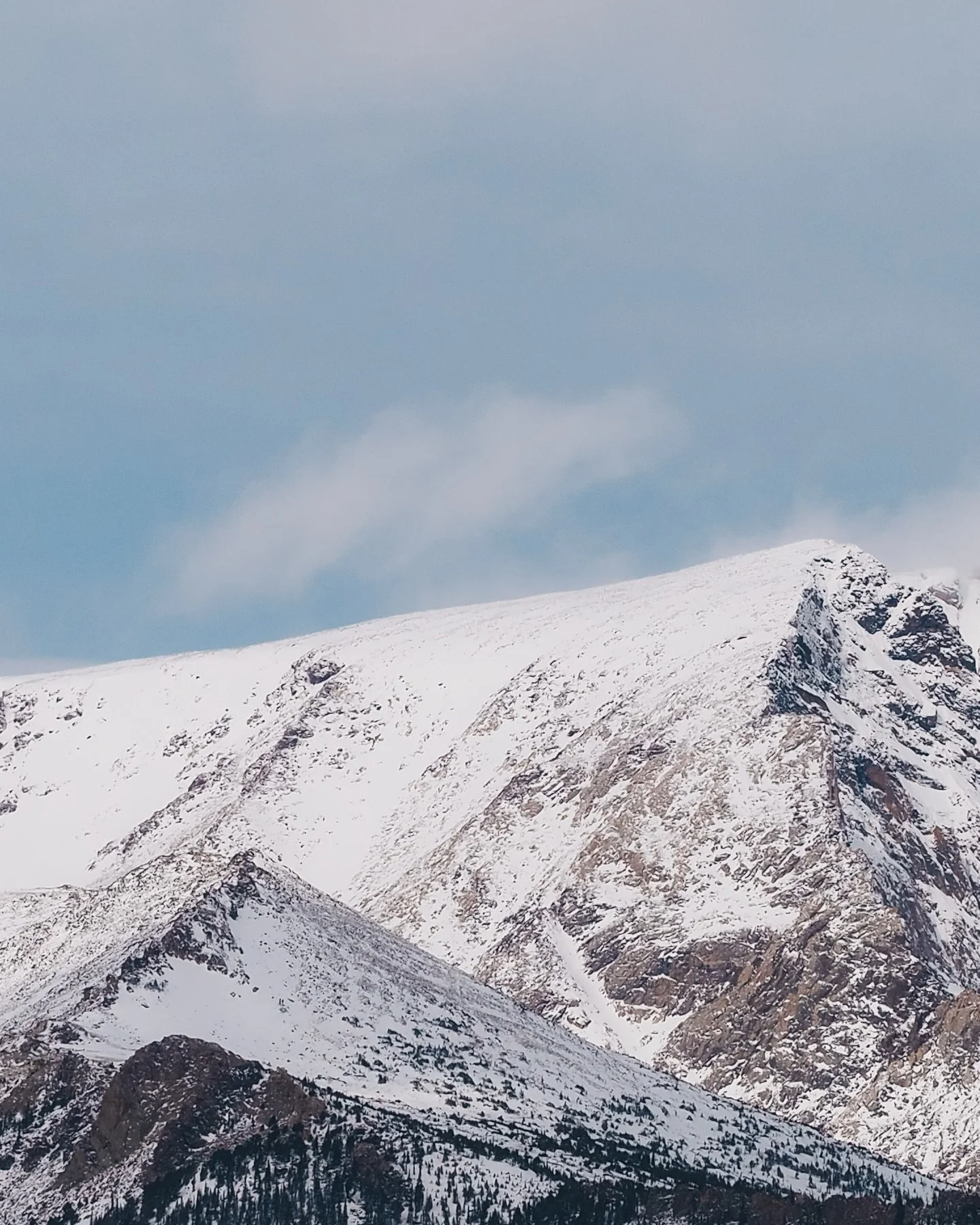 Rocky Mountain National Park really made me feel the altitude.

Seeing mountains this tall, with their tops covered in snow, was incredible. As a flatlander, my lungs were definitely working overtime and I had to stop more than once just to catch my 