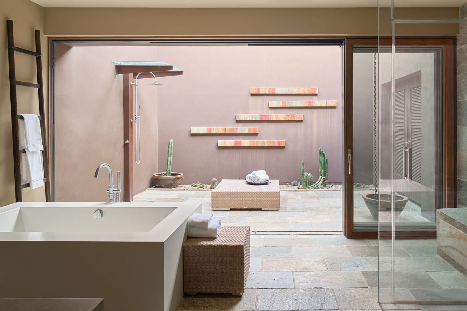 image of an indoor-outdoor bathroom with a unique angle to showcase interior design work