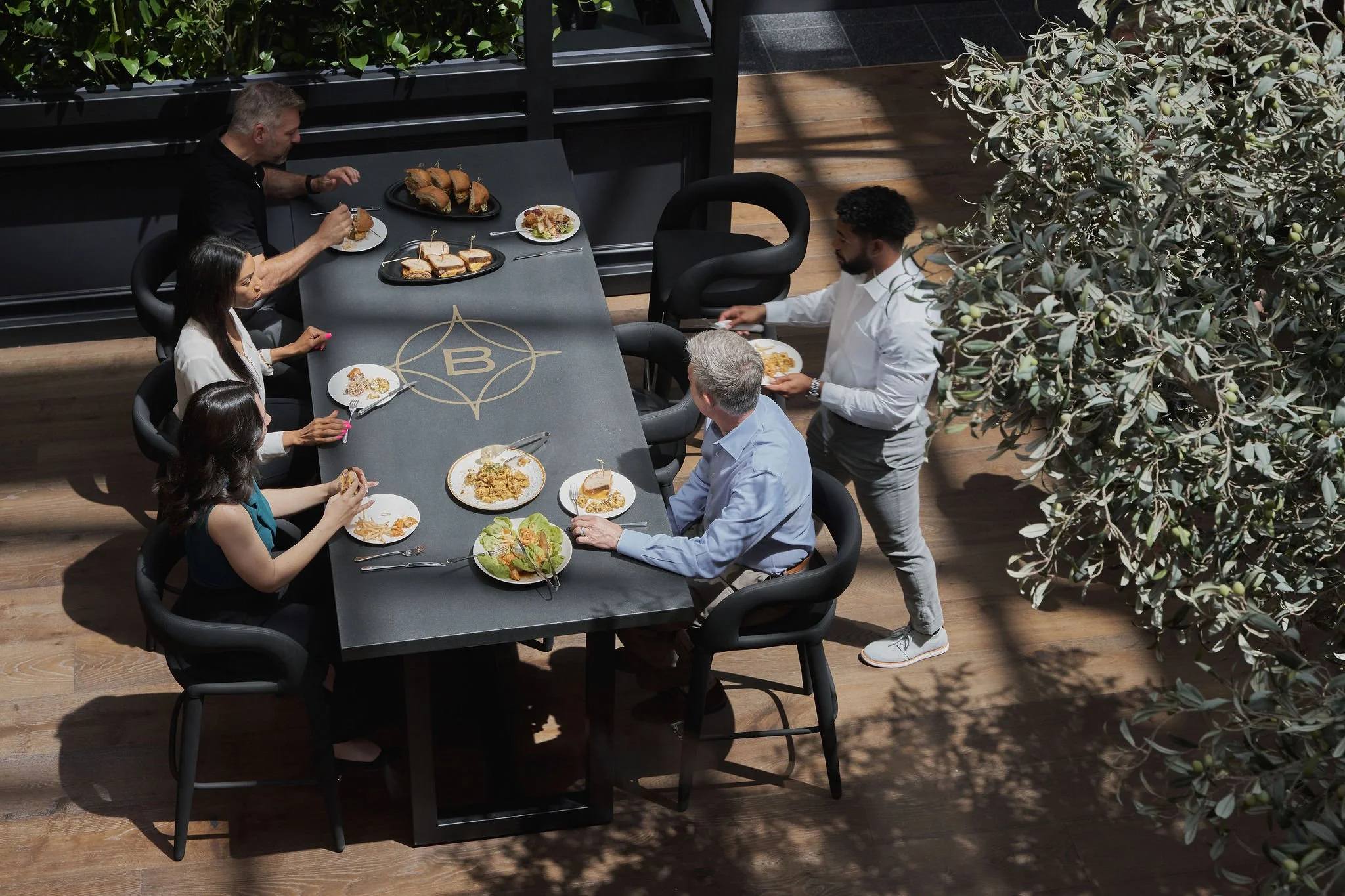 Commercial photography with models to make a space feel more natural 