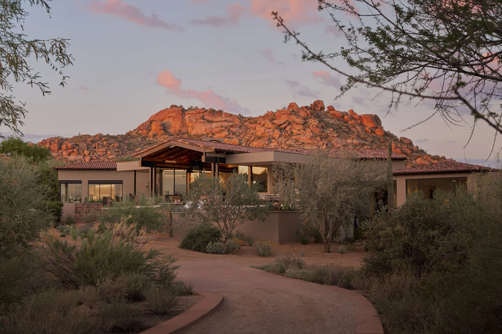 sunset image of modern desert home