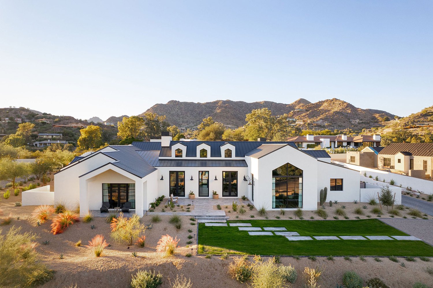 light and bright aerial drone image of a luxury home in scottsdale for real estate listing