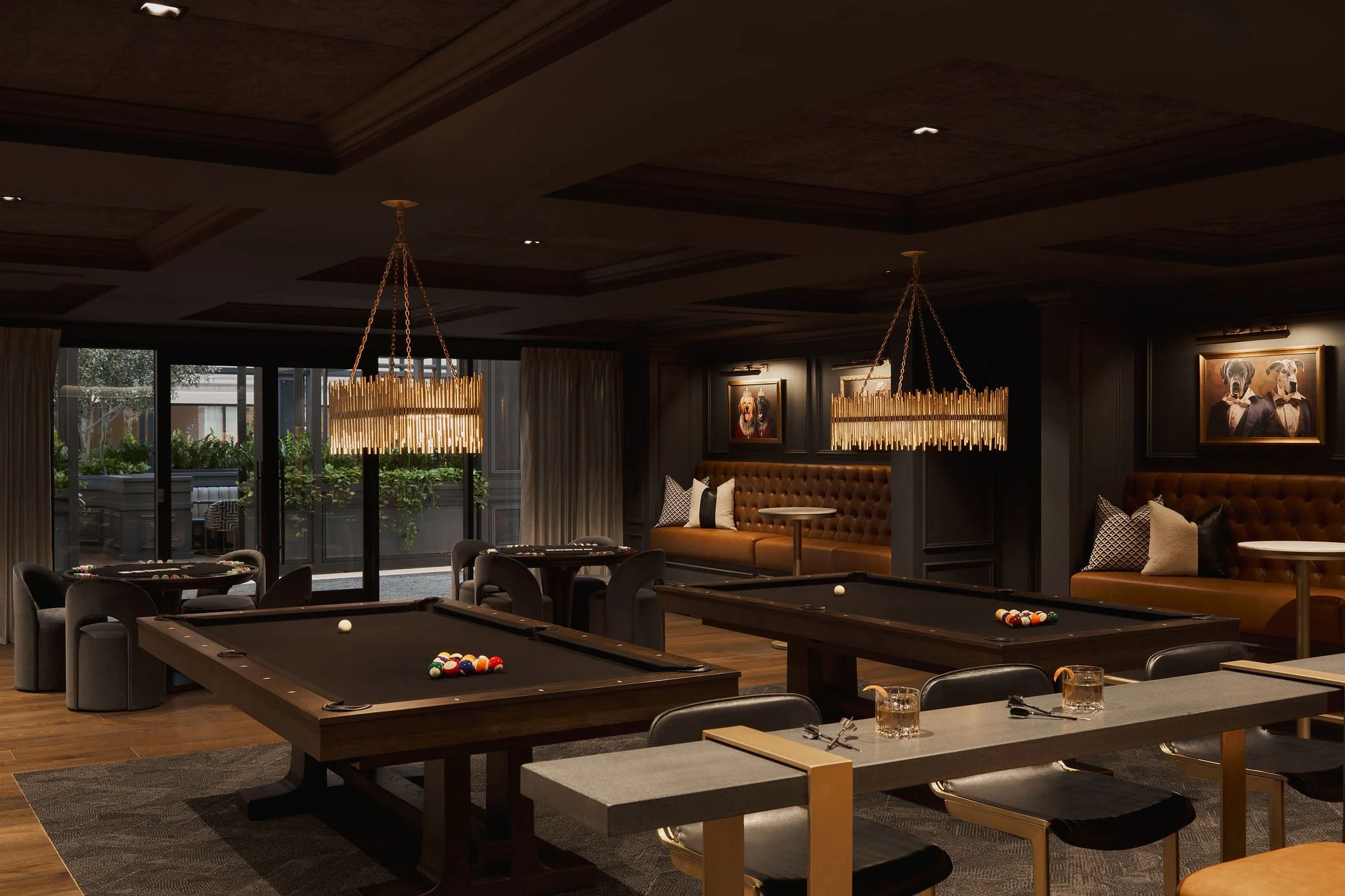 commercial interior design showcase of a dark billiards room 
