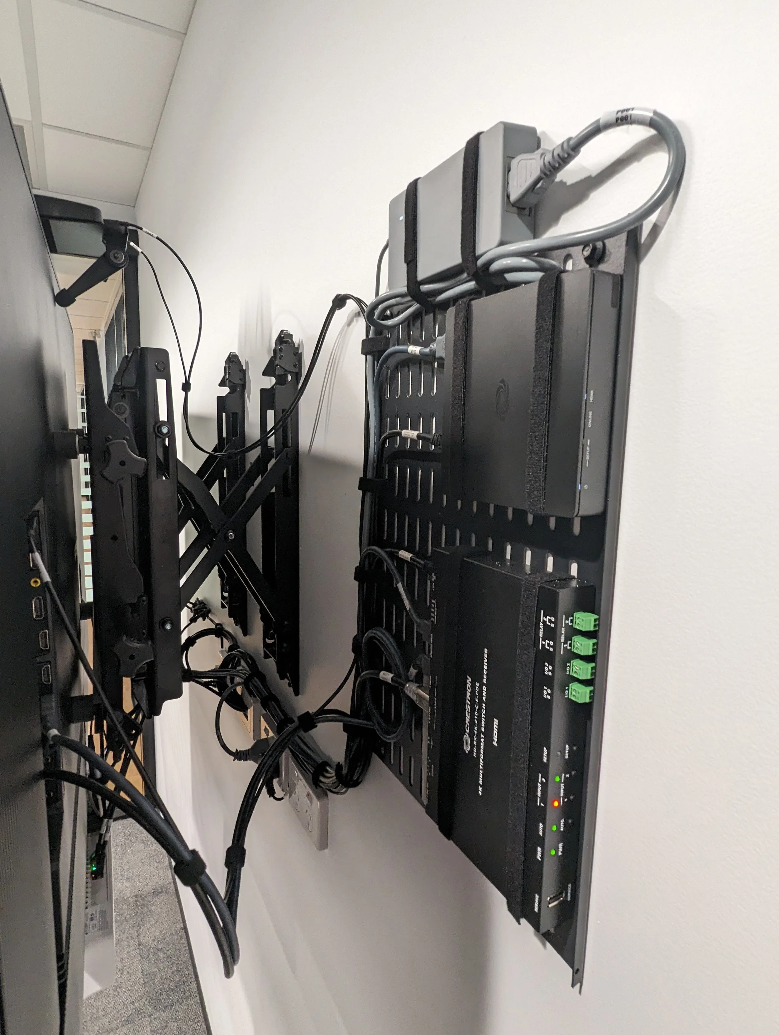 Wall-mounted commercial LCD display with pull out bracket and cable management