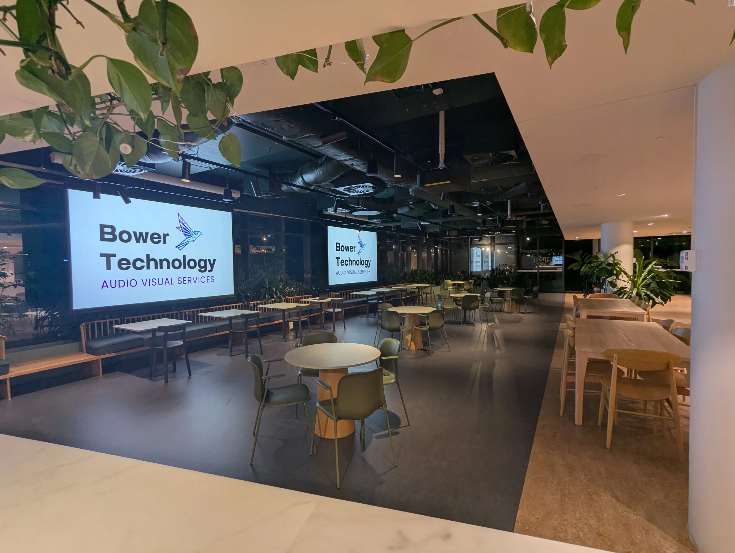 Workplace Town Hall Dual Projection System with Microsoft Teams and audio reinforcement with Biamp and Crestron control