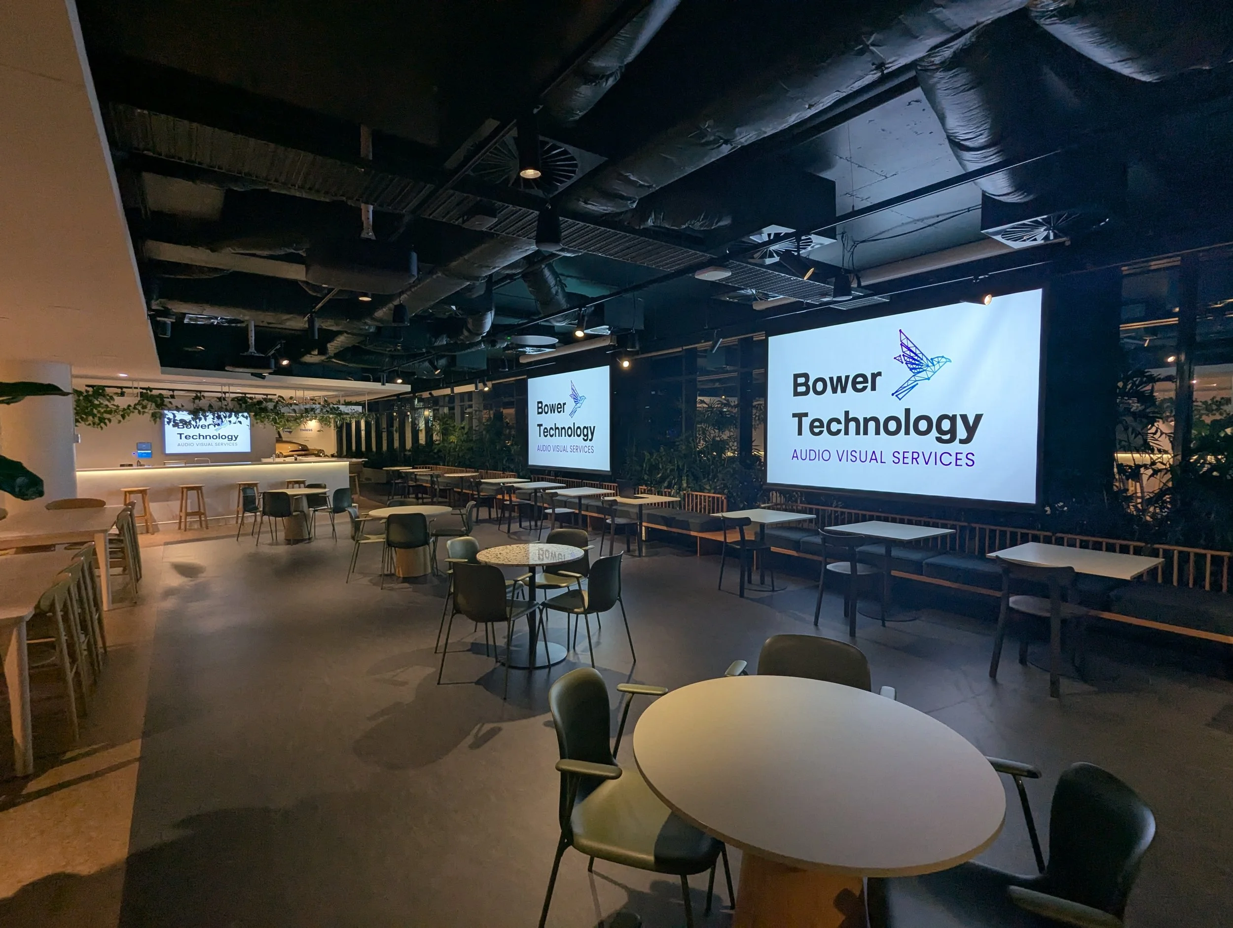 Workplace Town Hall Dual Projection System Installation with Microsoft Teams and audio reinforcement with Biamp and Crestron control