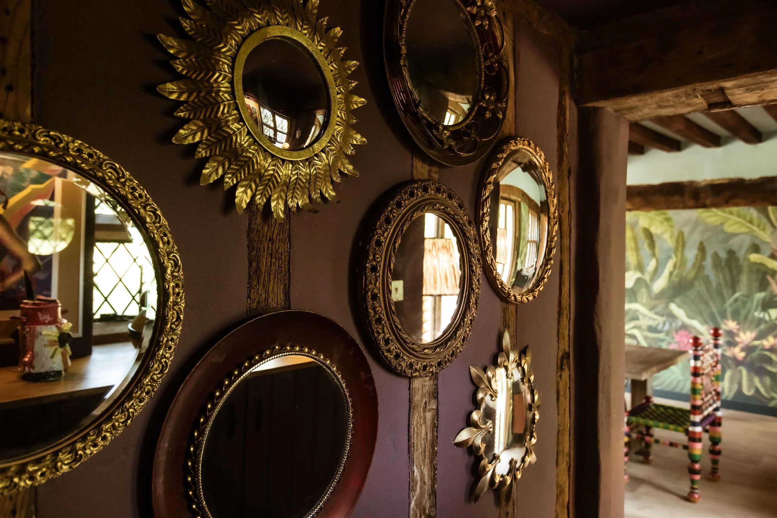 kent-period-manor-house-film-photo-shoot-event-location-unique-venue-hire-hall-circular-mirrors.jpg