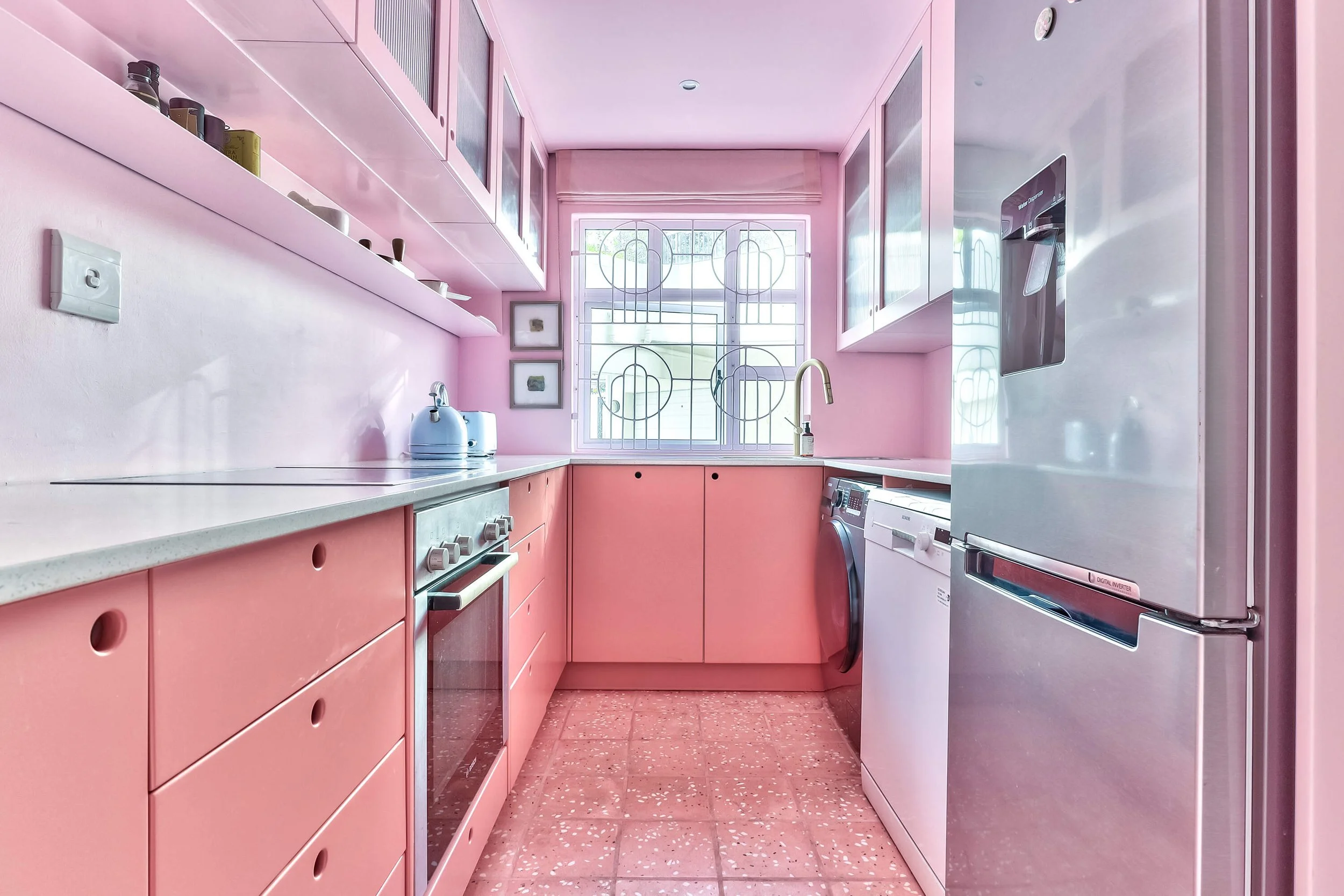 cape-town-wes-anderson-pink-kitsch-photo-studio-location-hire-retro-pink-kitchen.jpg