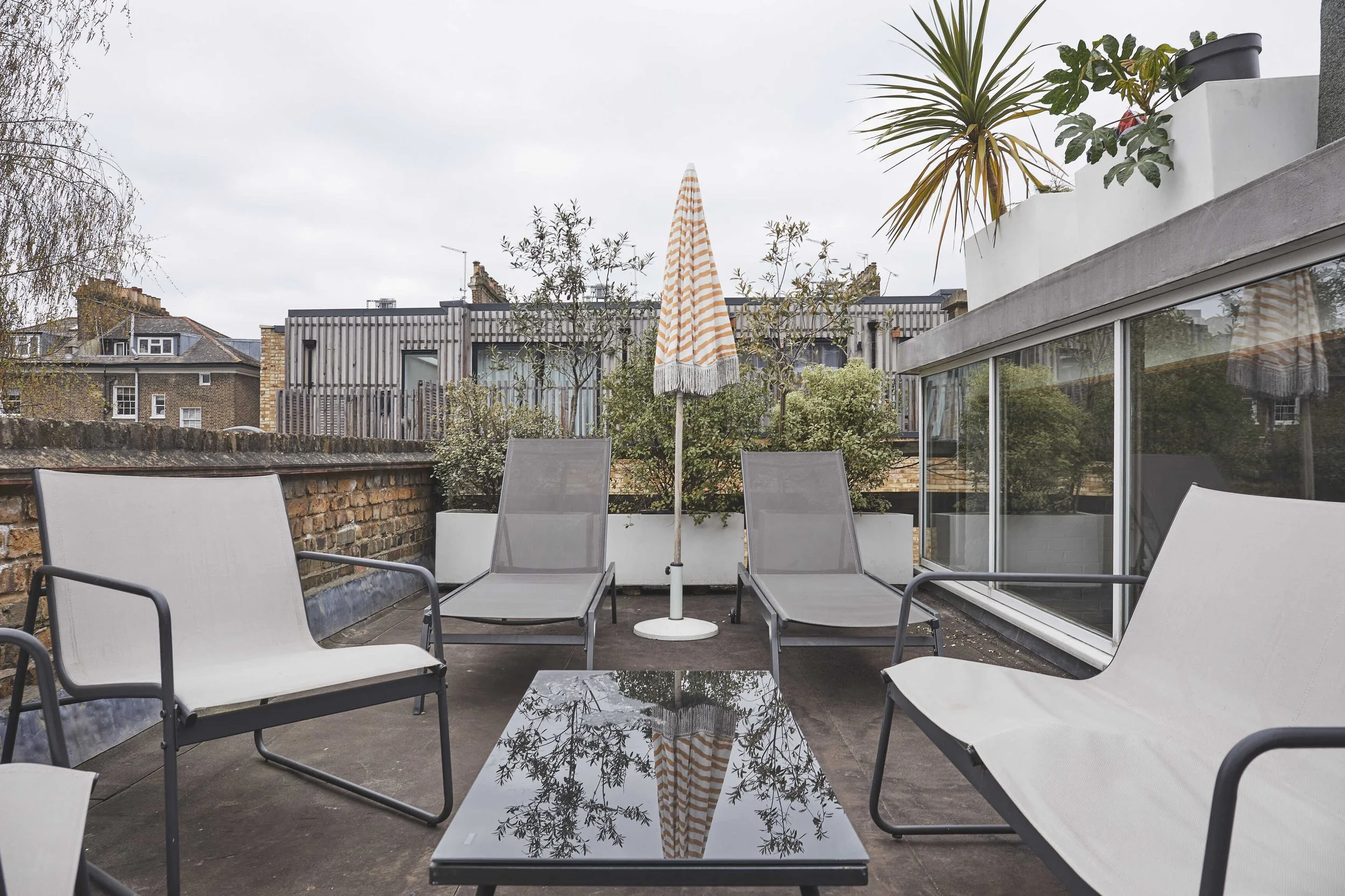london-retro-mid-century-photo-film-shoot-location-modern-1960s-patio-palms.jpg
