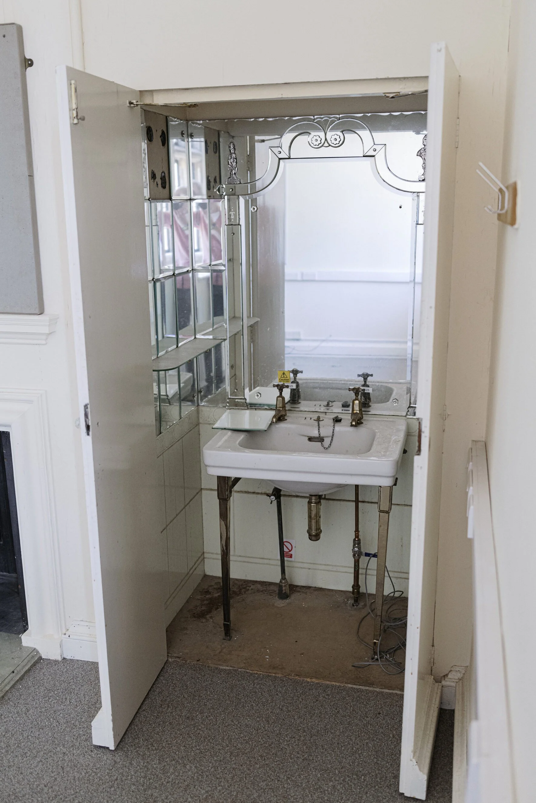 sussex-period-elizabethan-mansion-film-photo-shoot-location-unique-venue-hire-bathroom-mirror.jpg