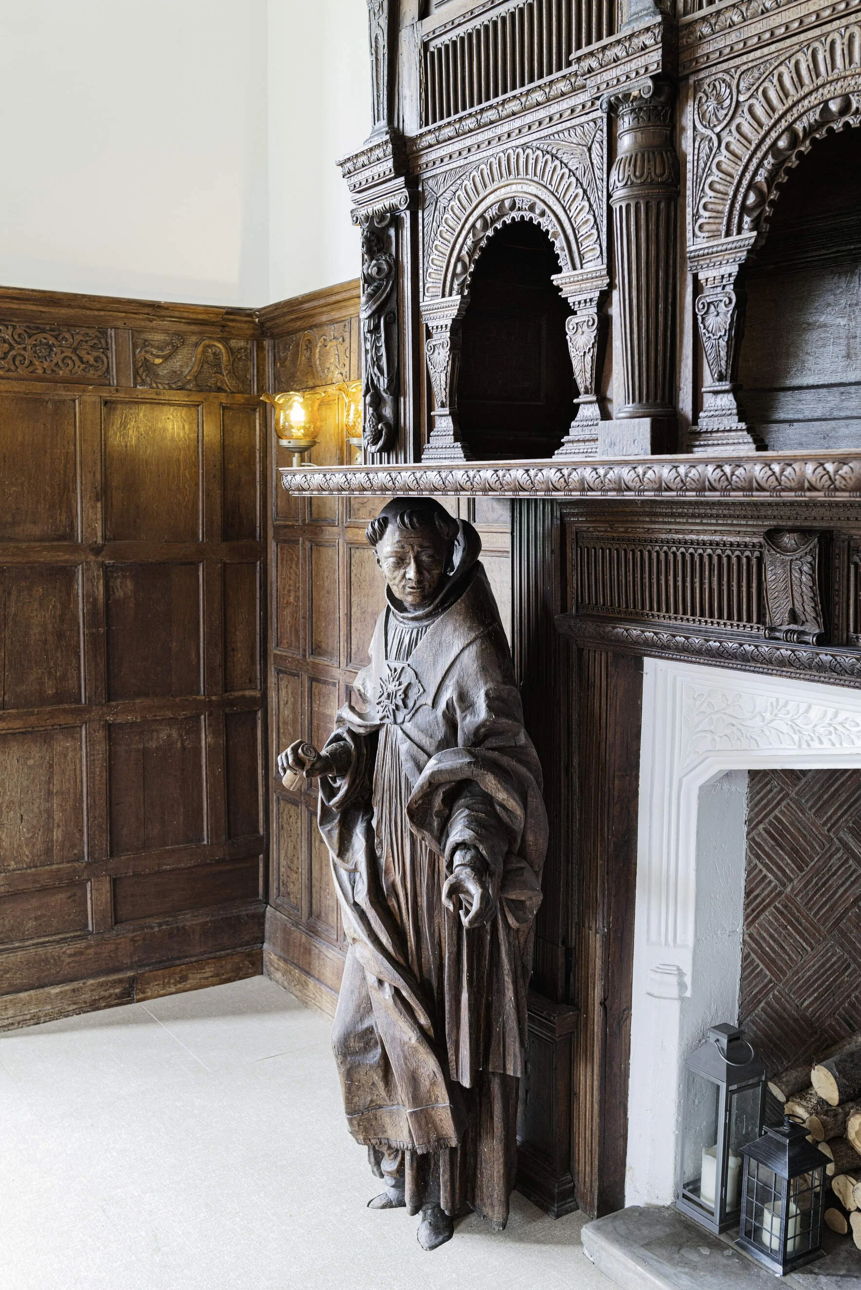 sussex-period-elizabethan-mansion-film-photo-shoot-location-unique-venue-hire-fireplace-statue.jpg