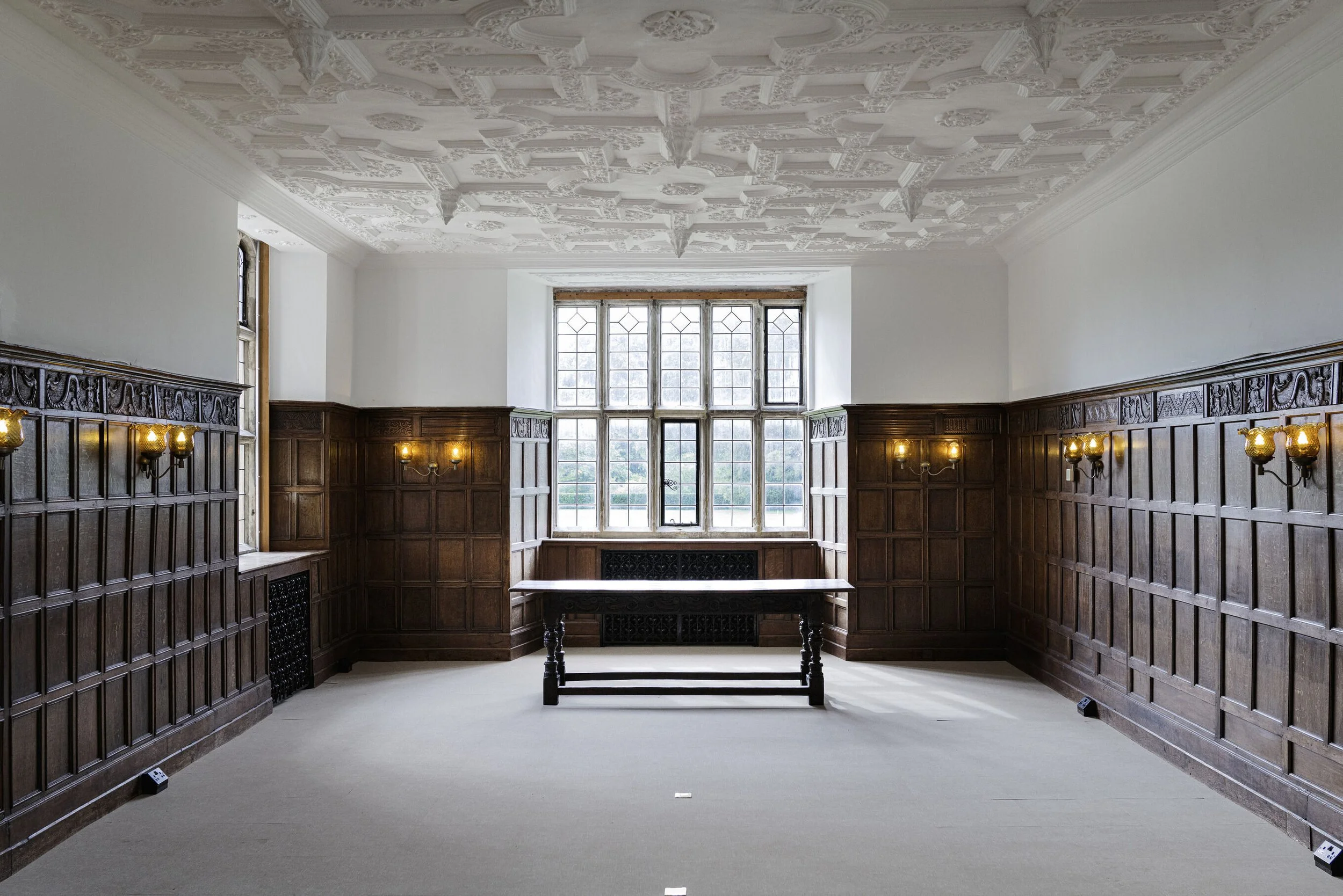 sussex-period-elizabethan-mansion-film-photo-shoot-location-unique-venue-hire-interior-table.jpg