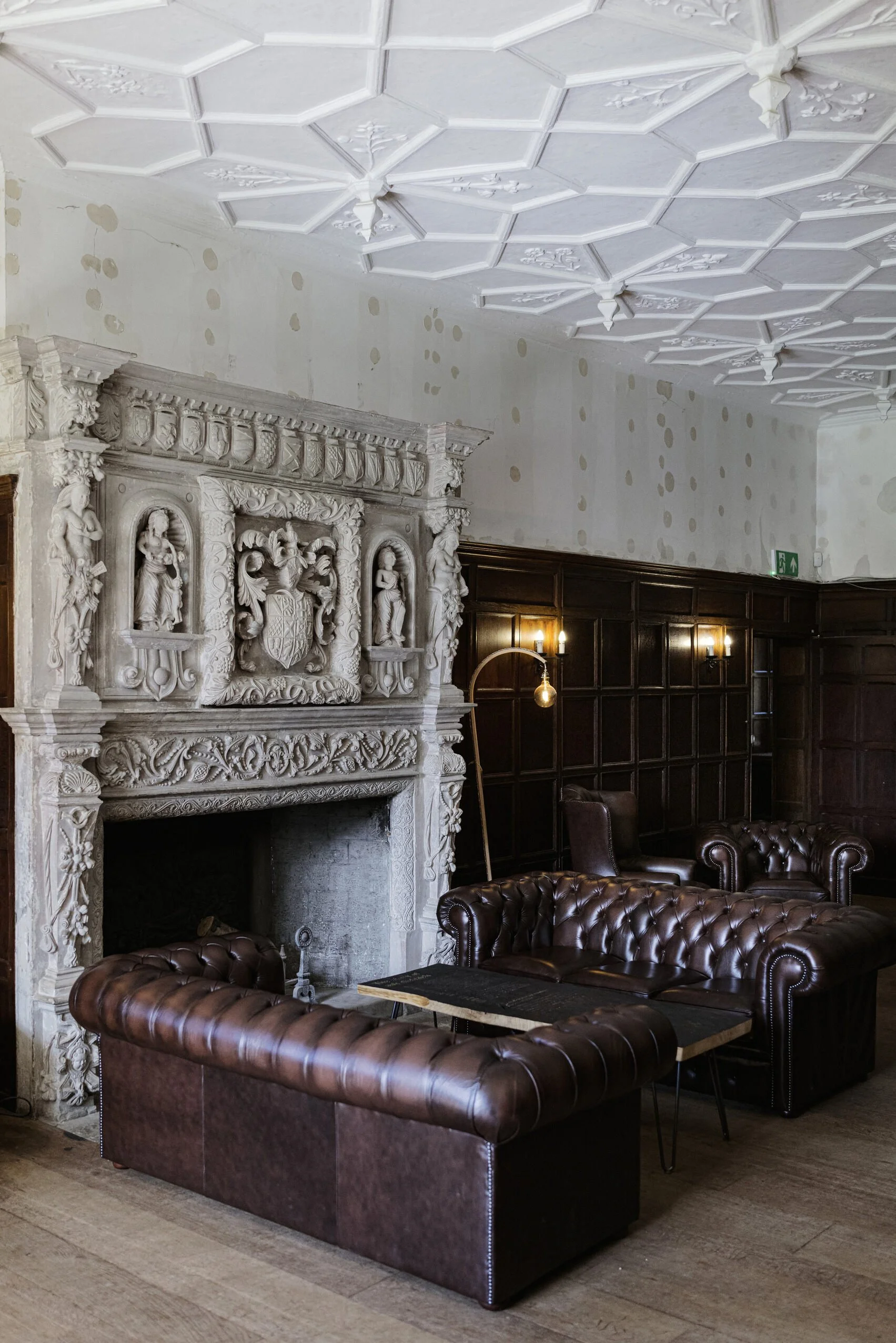 sussex-period-elizabethan-mansion-film-photo-shoot-location-unique-venue-hire-ornate-fireplace.jpg