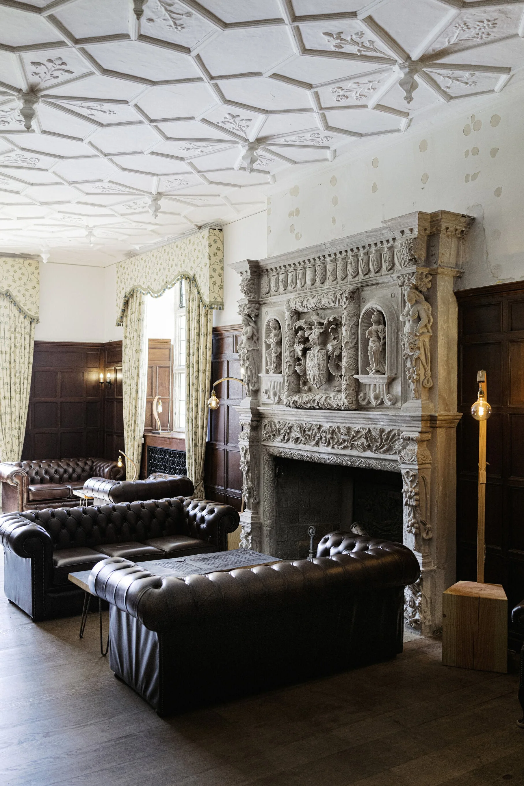 sussex-period-elizabethan-mansion-film-photo-shoot-location-unique-venue-hire-stone-fireplace.jpg