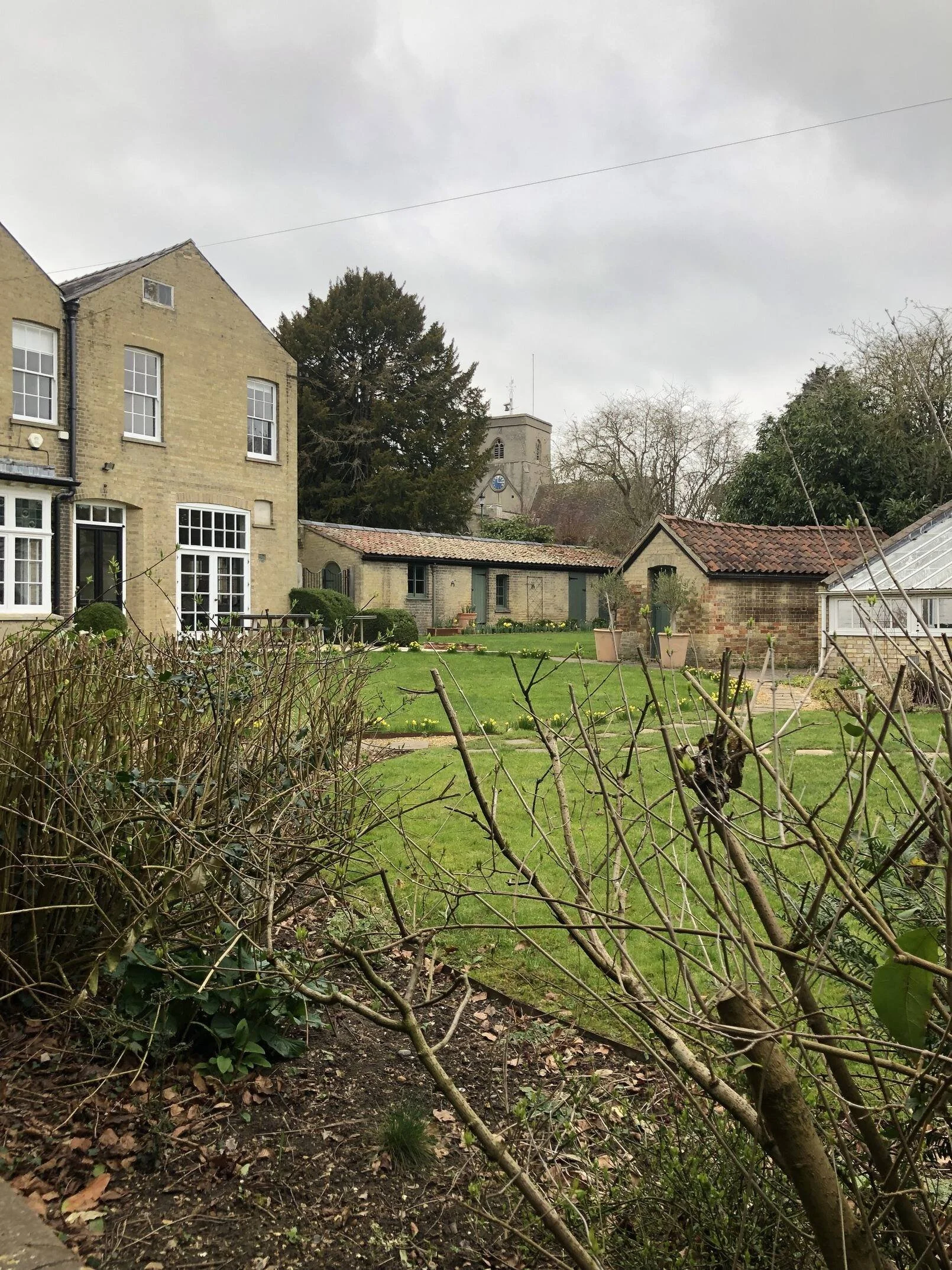 cambridgeshire-period-manor-house-film-photo-shoot-event-location-unique-venue-hire-external-view-church.jpg