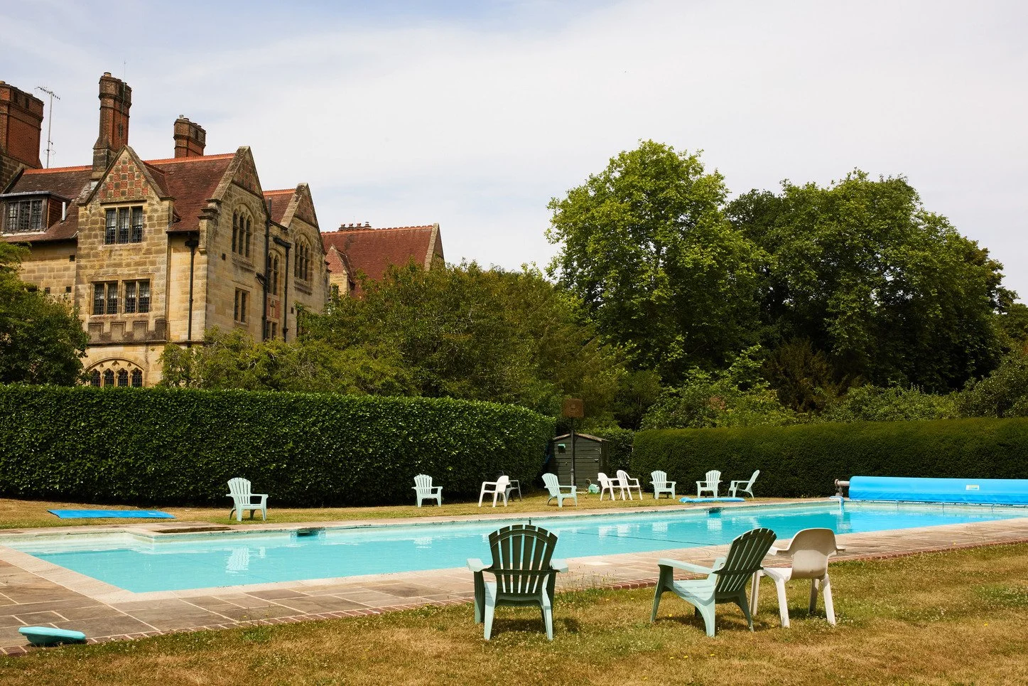 west-sussex-period-convent-film-photo-shoot-location-unique-venue-hire-pool-side-chairs.jpg