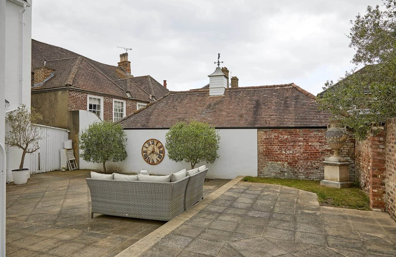 surrey-historic-period-georgian-house-film-photo-shoot-location-unique-venue-event-hire-patio-olive-trees.jpg