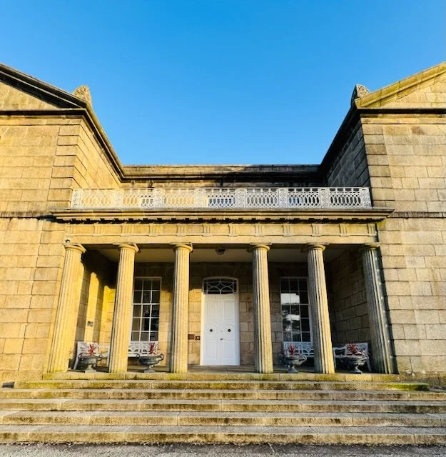 cornwall-historic-regency-country-house-film-photo-shoot-event-location-unique-venue-hire-exterior-colonades.jpeg