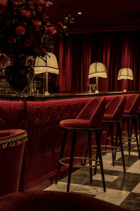 london-historic-private-members-club-film-photo-shoot-event-location-unique-venue-hire-fine-dining-red-velvet-bar-stools.png