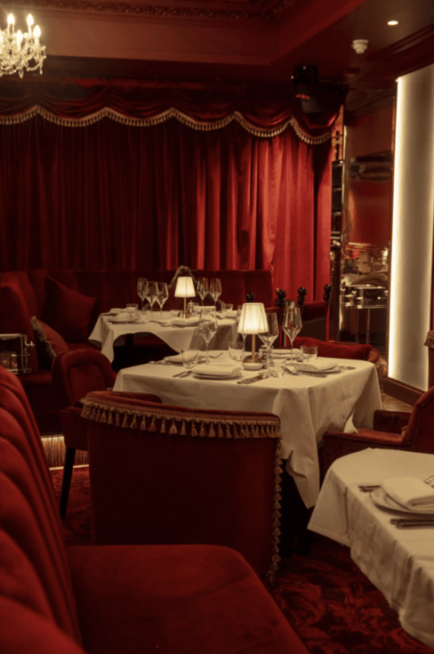 london-historic-private-members-club-film-photo-shoot-event-location-unique-venue-hire-fine-dining-restaurant-velvet-red-curtains.png