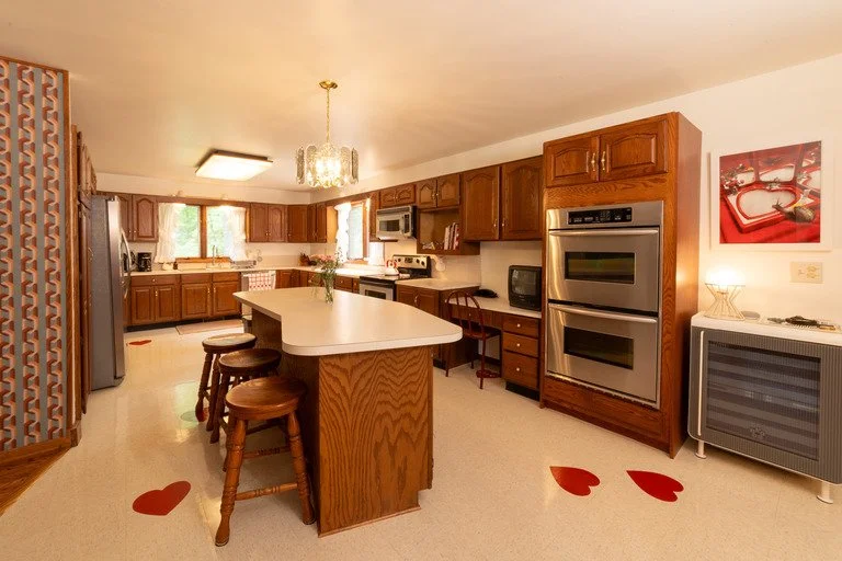 michigan-usa-kitsch-mid-century-house-film-photo-shoot-location-unique-venue-hire-kitchen-red-heart-floor-tiles.jpg