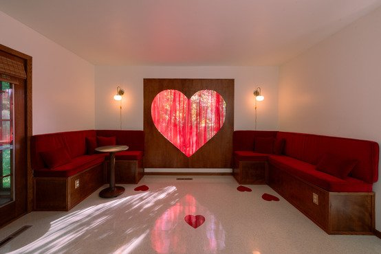 michigan-usa-kitsch-mid-century-house-film-photo-shoot-location-unique-venue-hire-kitchen-red-seating-area-heart-window.jpg