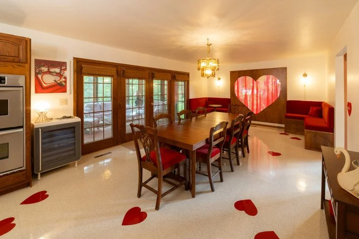 michigan-usa-kitsch-mid-century-house-film-photo-shoot-location-unique-venue-hire-red-heart-window-kitchen-table.jpg