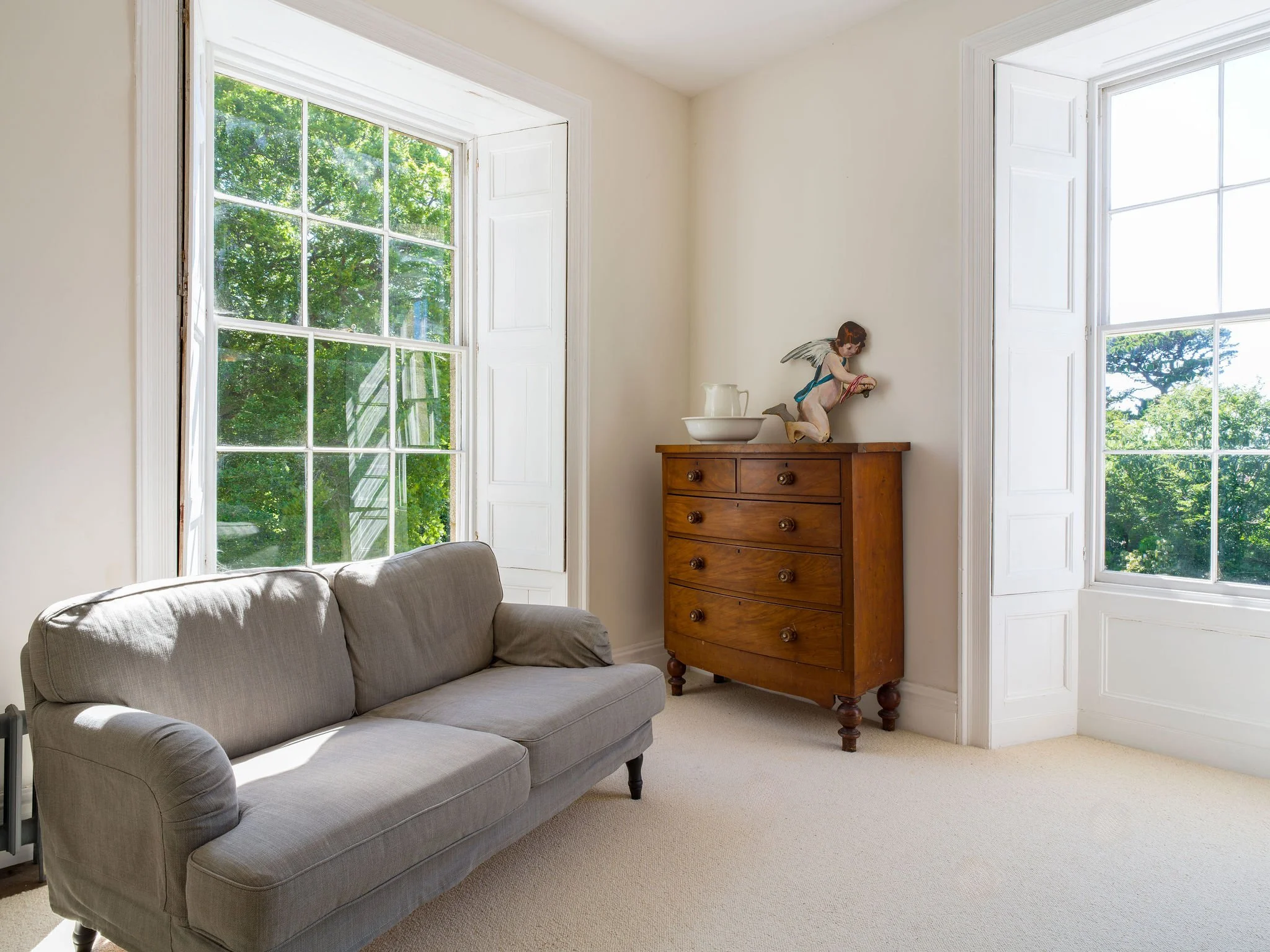 cornwall-historic-regency-country-house-film-photo-shoot-event-location-unique-venue-hire-grey-sofa.jpg