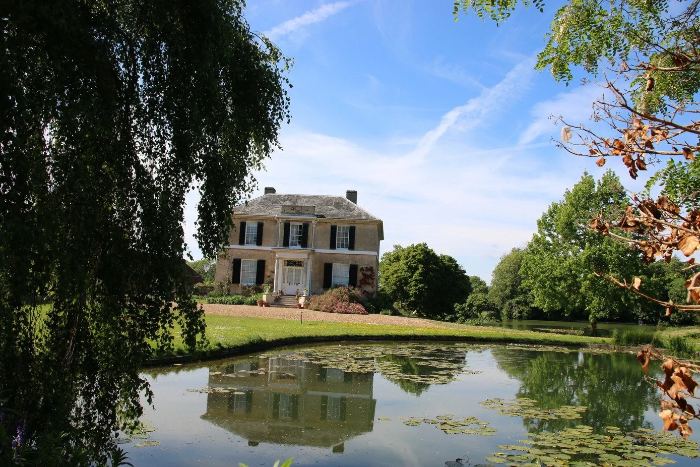 kent-historic-period-manor-house-film-photo-shoot-event-location-unique-venue-hire-facade-lake-view.jpg