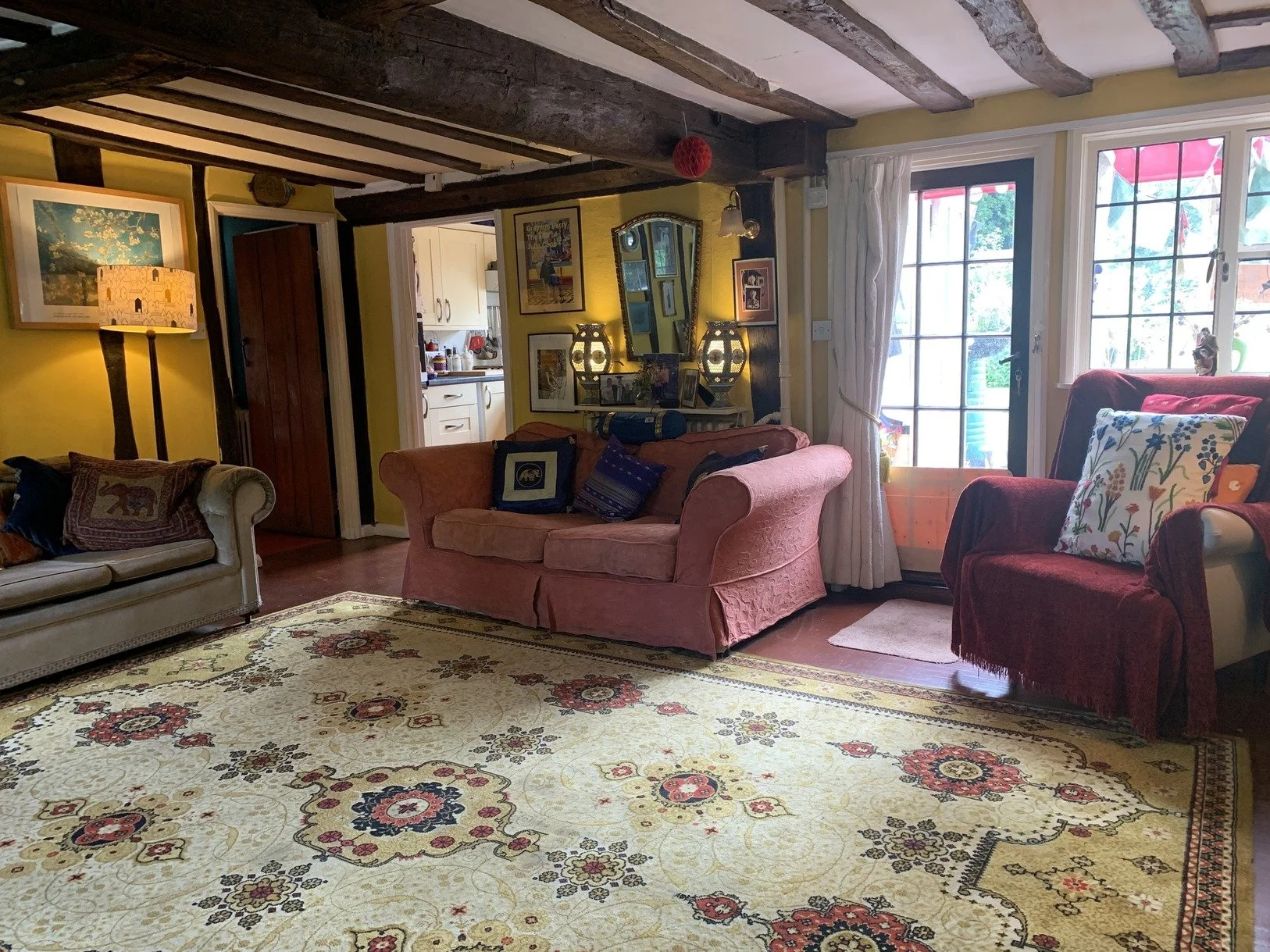 cambridgeshire-thatched-cottage-film-photo-shoot-location-unique-venue-hire-pink-sofa.jpg