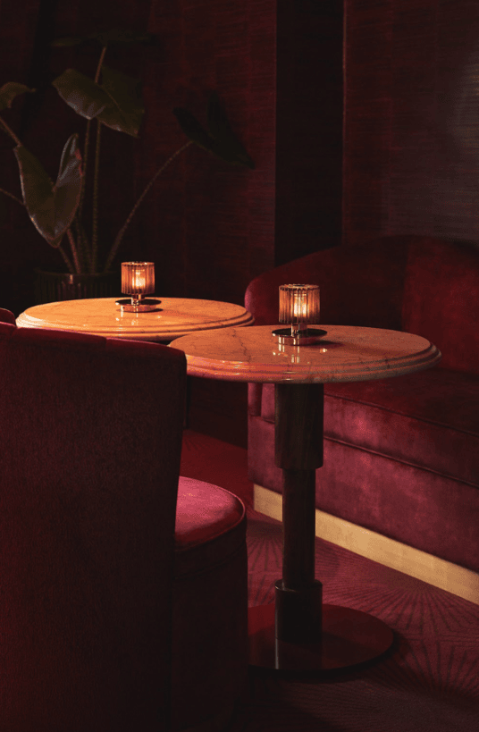 london-kings-cross-six-storey-multi-studio-venue-club-roof-terrace-film-photo-shoot-events-location-unique-venue-hire-bat-circular-table-bar-stool.png